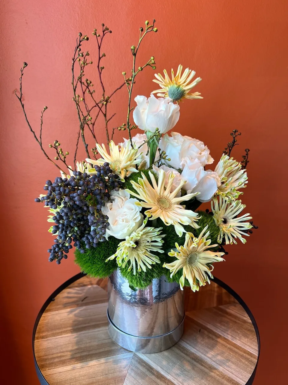 Creamy gerbera, white lisianthus and blue berry branches in a Bloom Room Studio flowerbox, Koh Samui