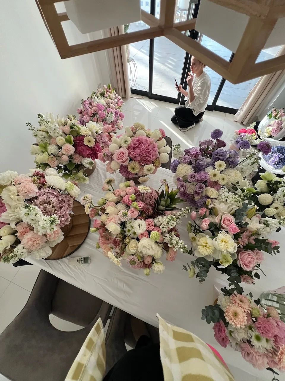 Collection of pastel arrangements on a table at Bloom Room Studio, Koh Samui